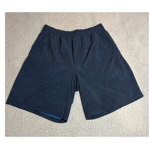 Lululemon men's Large Pace Breaker shorts (B120277)
